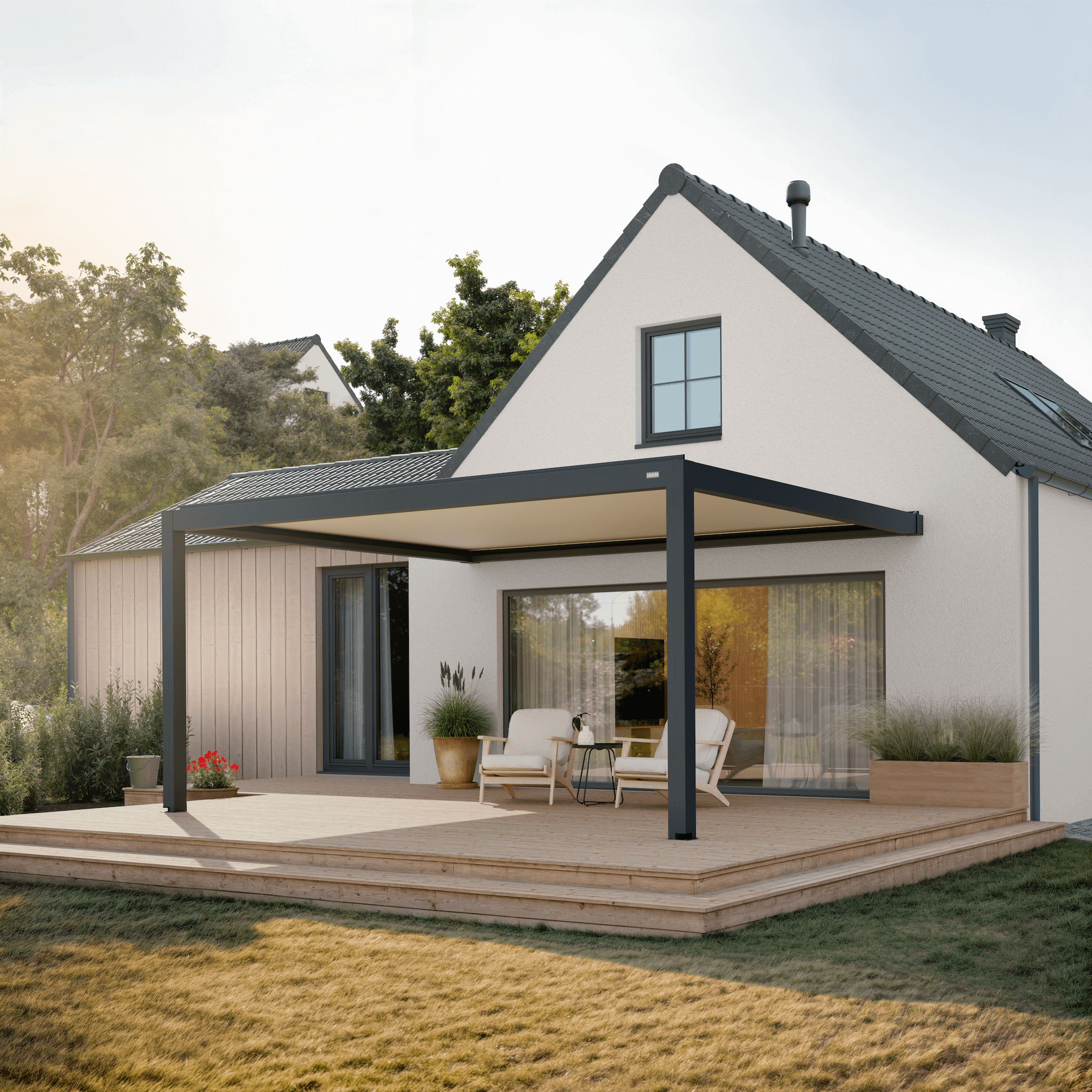 Wall-mounted anthracite louvered pergola on a modern home