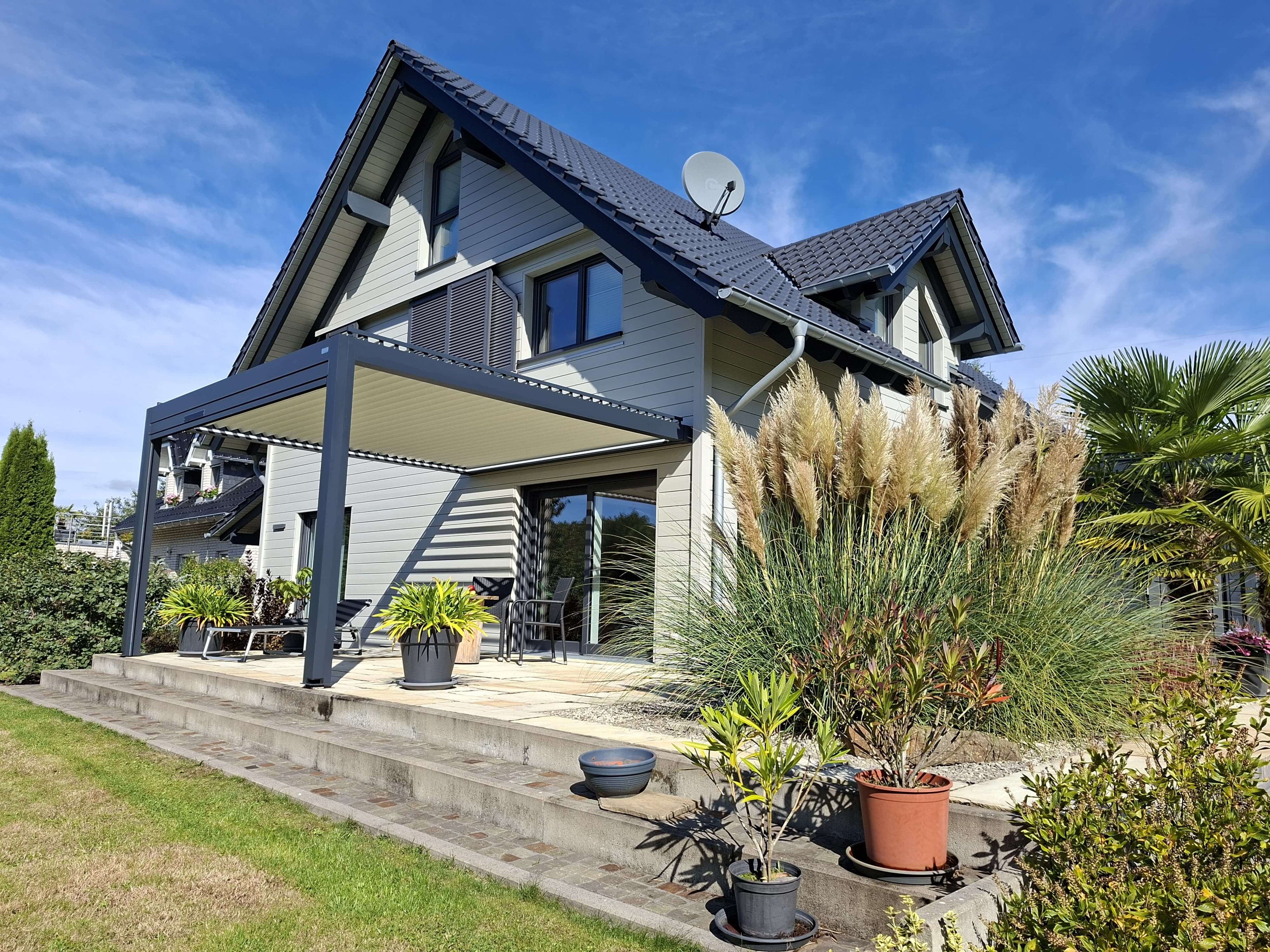 Louvered pergola on a modern family home