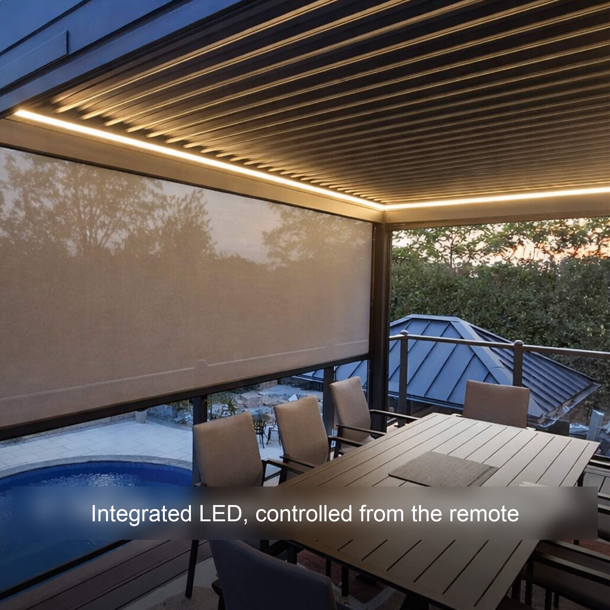 Integrated warm-white LED lighting under a louvered pergola at dusk