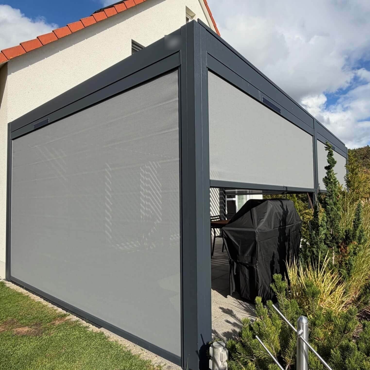 Aluminum pergola with retractable side screens fully closed