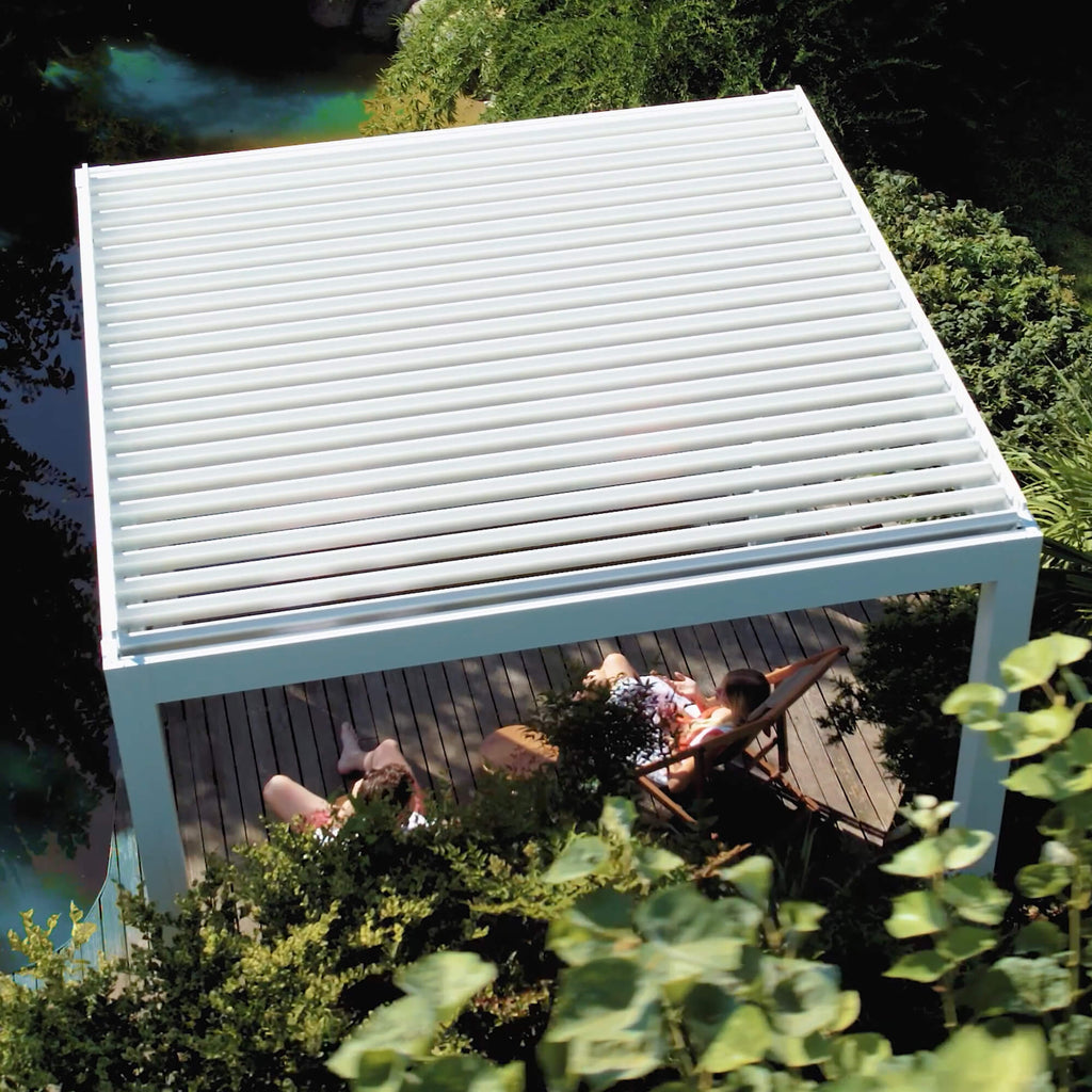 White louvered pergola with open louvers seen from above